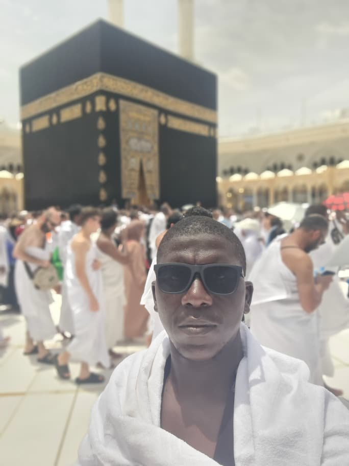 Pilgrim in Ihram performing Tawaf in front of the Holy Kaaba in Makkah