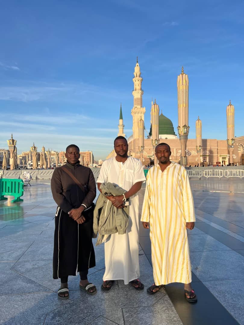 Pilgrims at the grand marble plaza of the Prophet’s Mosque